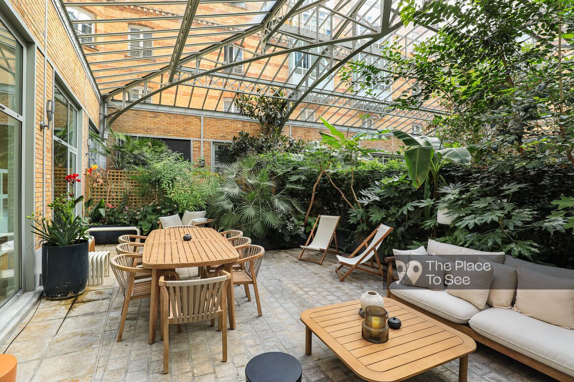 Terrasse sous verrière Eiffel