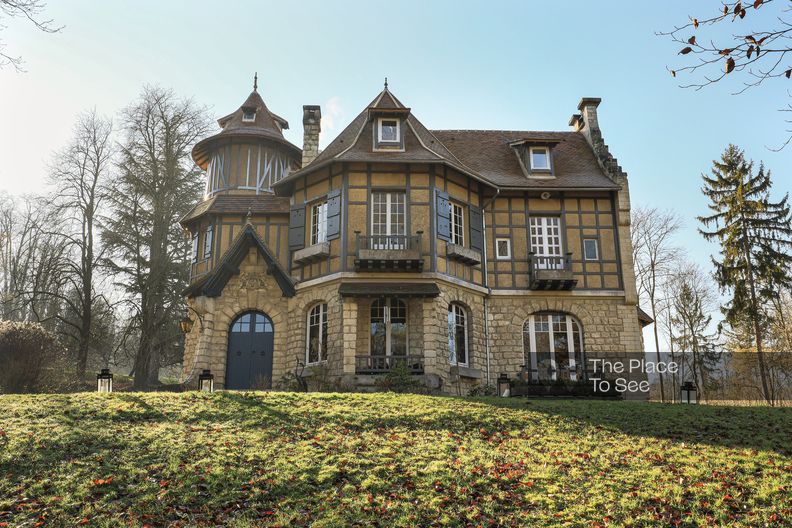 Renovated mansion stone and half-timbering facade