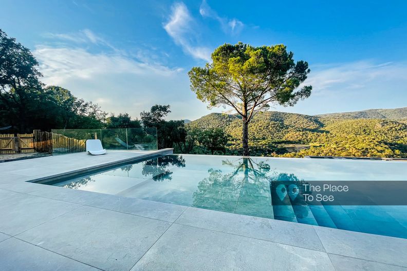 Architect house in an olive garden and vineyard