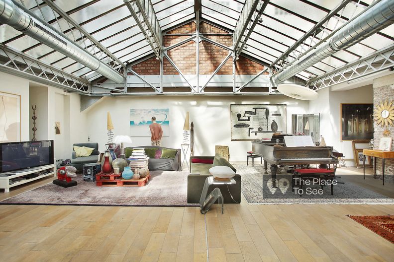 Loft under a beautiful industrial glass roof