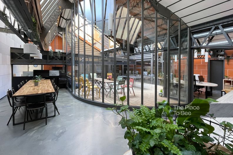 Office and open space in an industrial loft