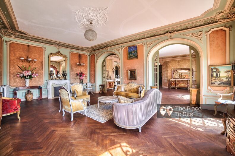 Colorful apartment in an 18th century building with moldings