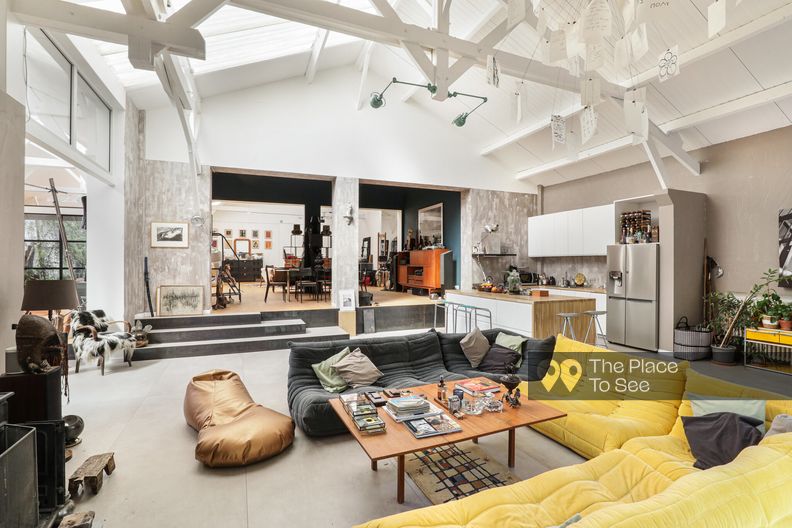 Huge loft under glass roof with two living rooms