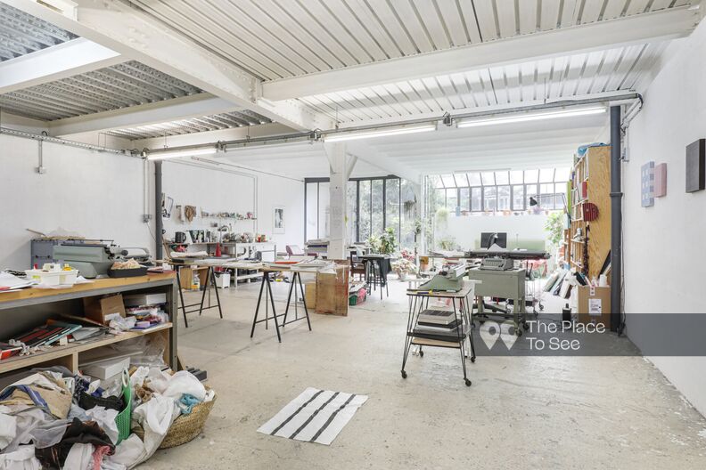 Raw industrial space with small glass roof