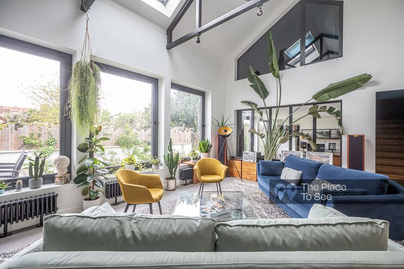 Town house with contemporary cladding extension