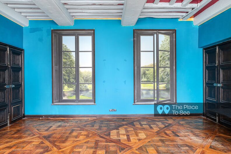 Empty and weathered colorful old Paris apartment